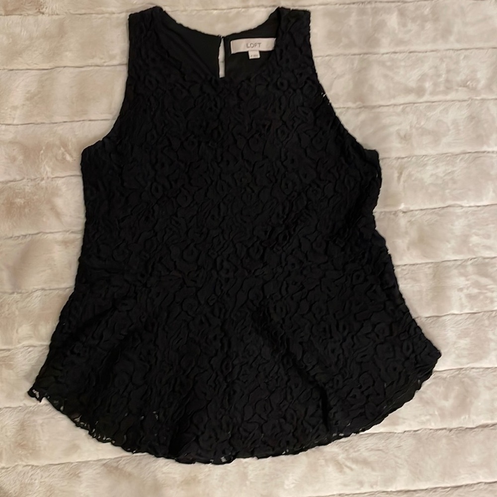 Black knit peplum with subtle leopard pattern size XS